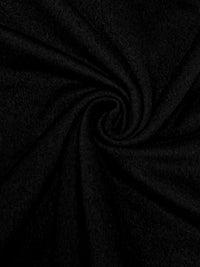 Close-up of black fabric with folds