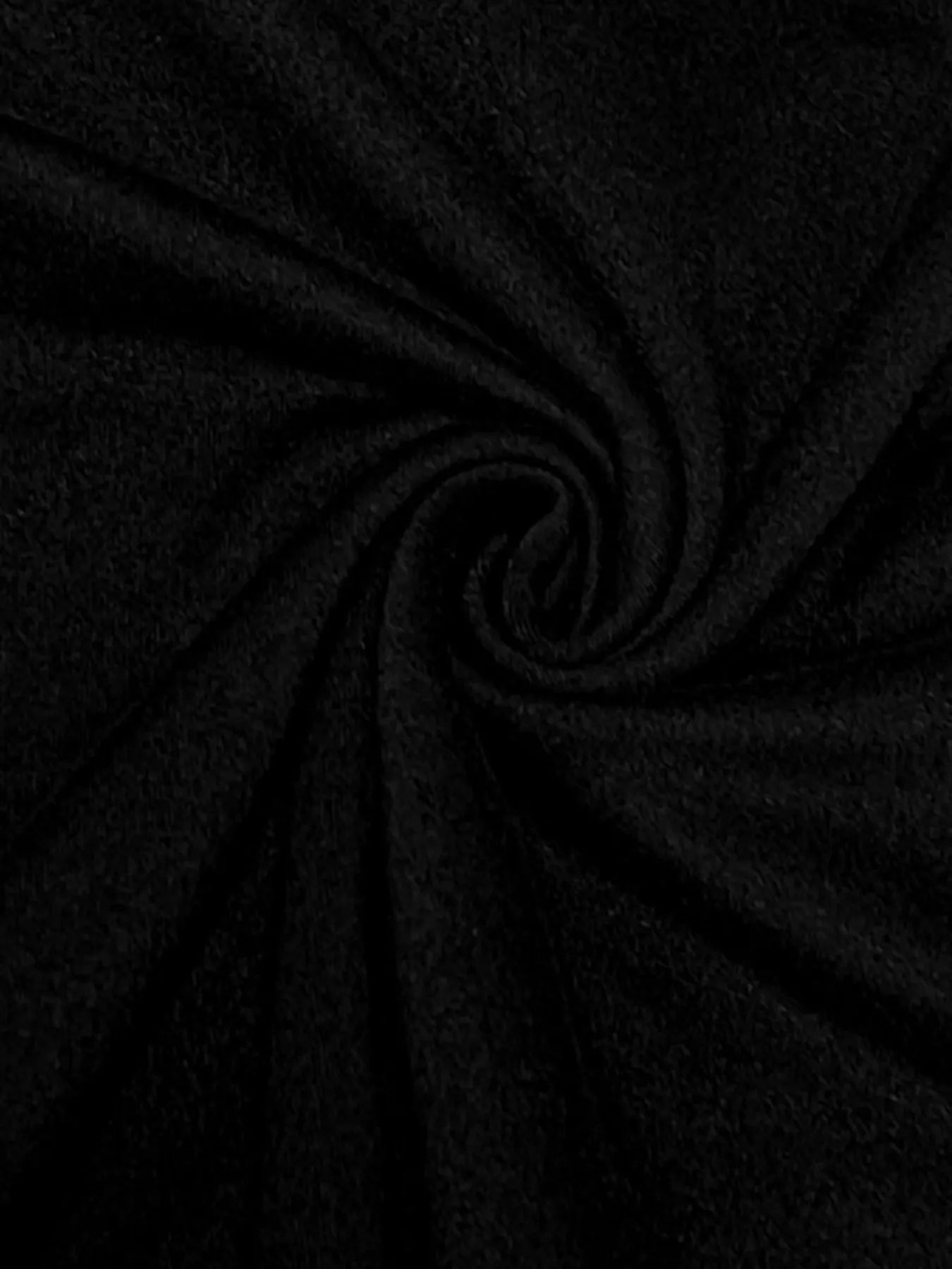 Close-up of black fabric with folds