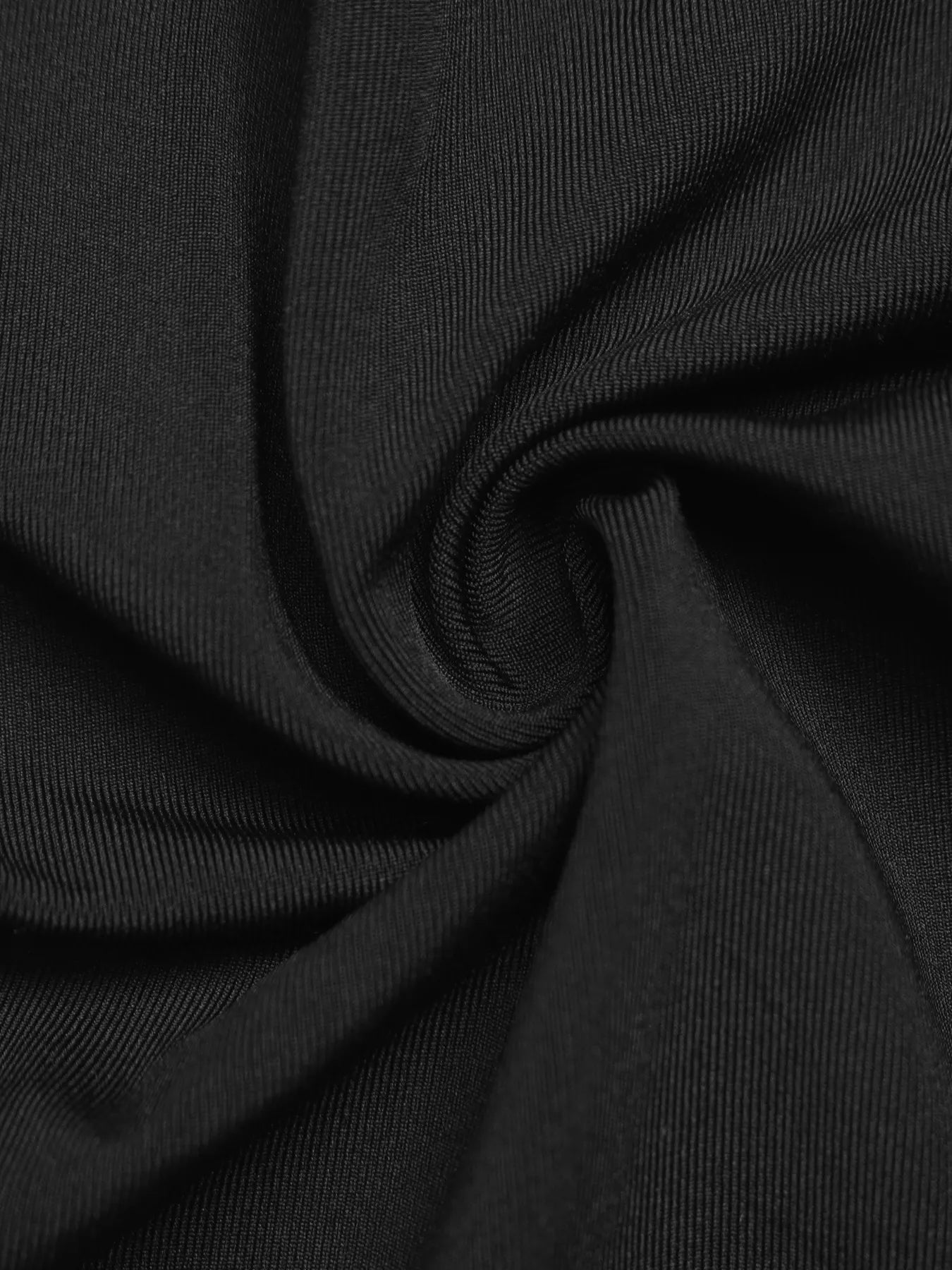 Close-up of black fabric with a textured pattern