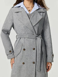 Gray coat with a belt on a white background