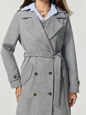 Gray coat with a belt on a white background