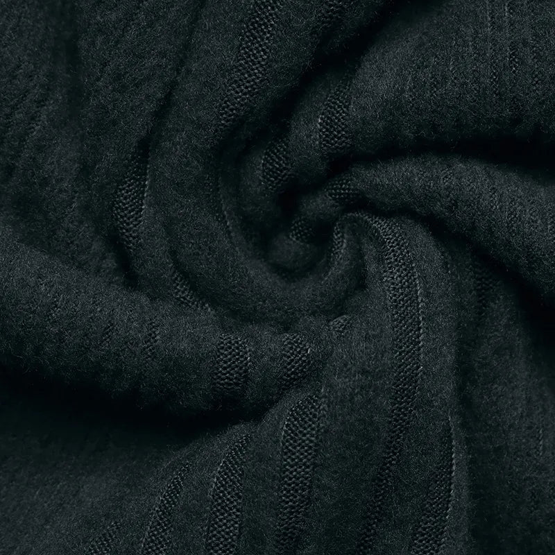 Dark gray fabric with a textured pattern