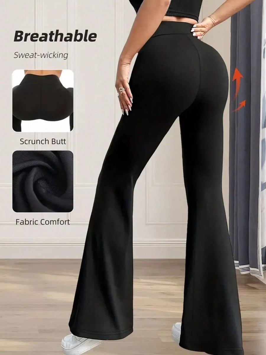 Black flared leggings worn by a person, with features highlighted on a white background.