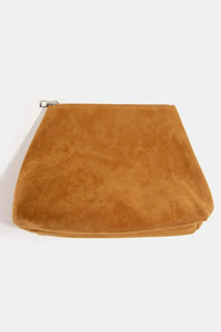 Brown suede pouch on a white background