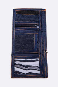 Blue denim wallet with zippers on a white background