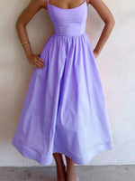 Lavender dress worn by a person against a plain background