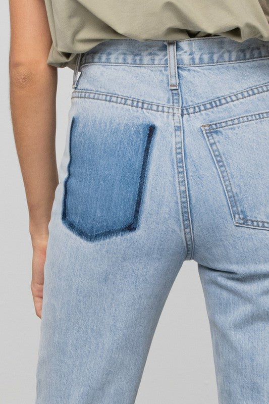Close up the pocket on HIGH WAIST PREMIUM TAPERED JEANS