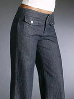 Dark blue jeans on a gray background