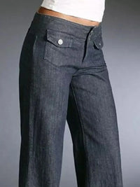 Dark blue jeans on a gray background