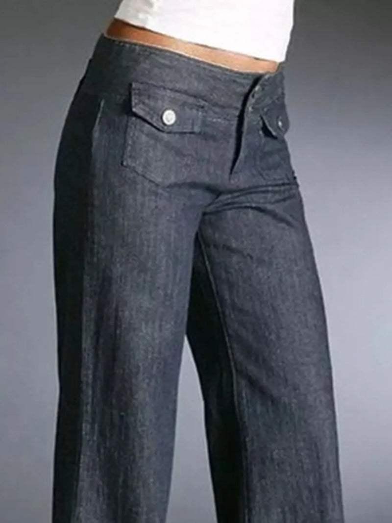 Dark blue jeans on a gray background