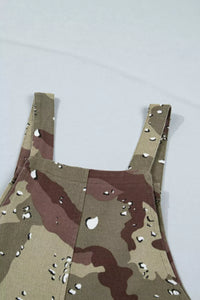 Camouflage-patterned apron with metal rivets on a white background