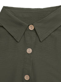 Close-up of a green shirt with button details on a white background