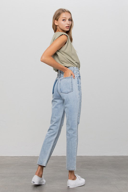 Side view of HIGH WAIST PREMIUM TAPERED JEANS