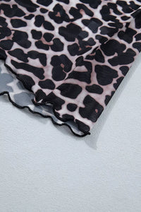 Leopard print fabric on a light gray background
