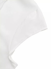 Close-up of a white t-shirt with a focus on the fabric texture.