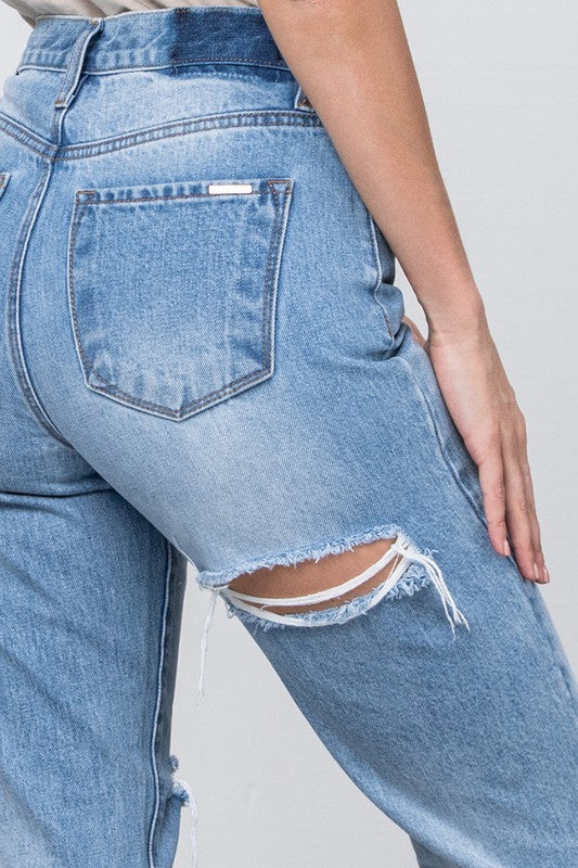 Close up of pocket on the right side of HIGH WAIST TAPERED JEANS