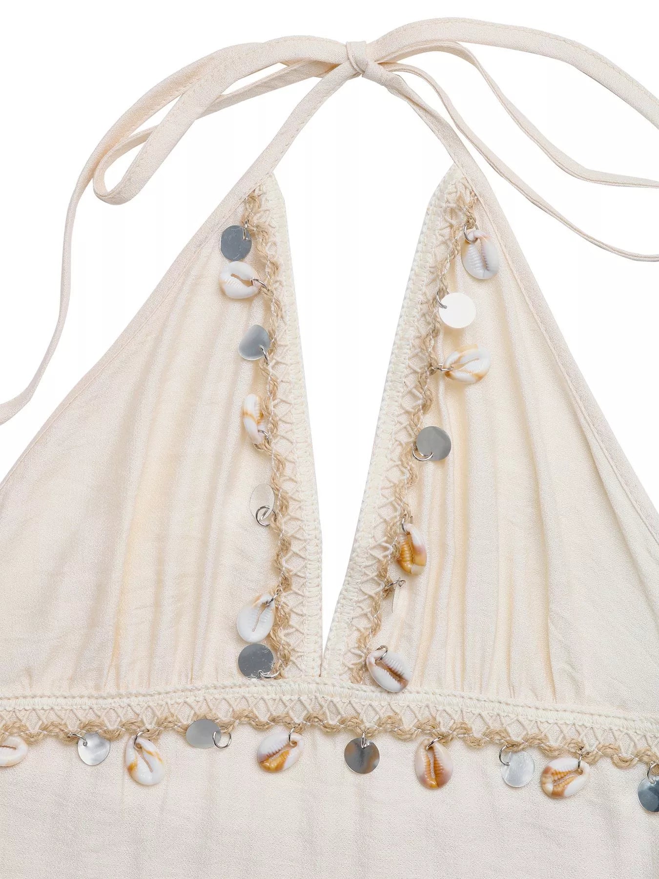 Beige bikini top with shell embellishments on a white background