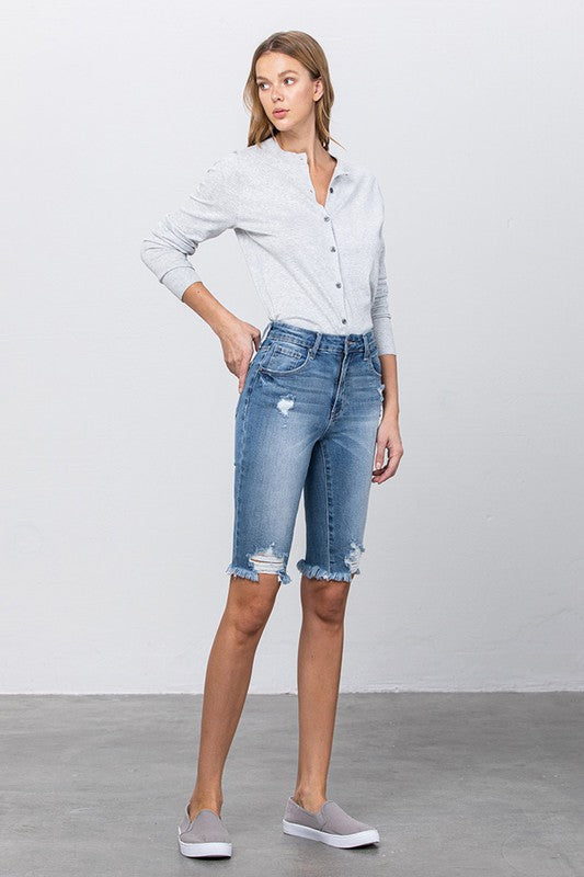 LEFT SIDE OF HEAVY AND LONG FRONT DESTROY BERMUDA SHORTS