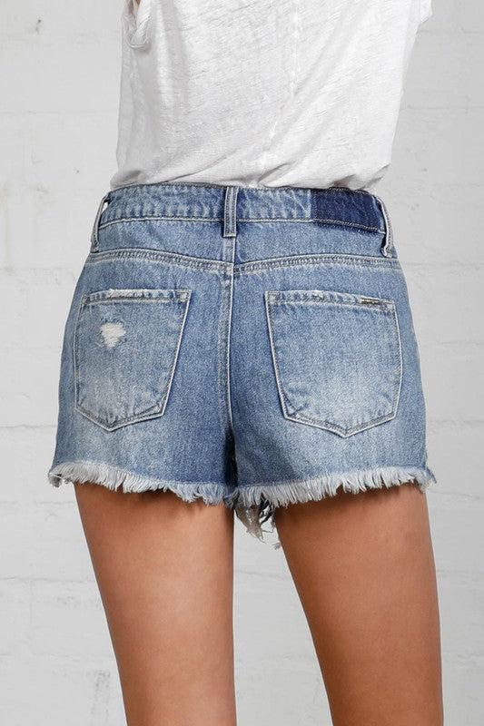 Close up of the back of HIGH RISE DESTROYED DENIM SHORTS