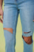 Close up view of distressed part of High Rise Distressed Wide Leg Jeans