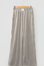 Striped skirt on a hanger against a white background