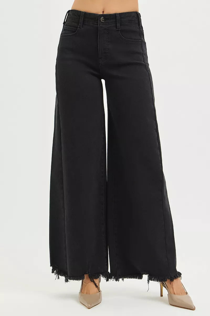 Black wide-leg jeans on a white background