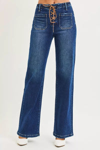Blue jeans with lace-up front on a white background
