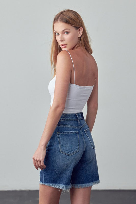Left side of High Rise Ripped Bermuda Denim Shorts