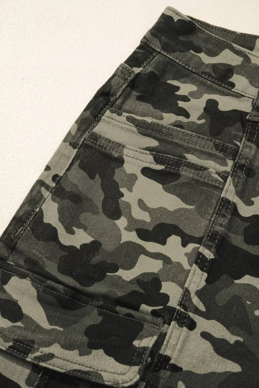 Camouflage pants on a white background