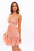 Side view of HALTER BABYDOLL TIERED MINI DRESS - apricot