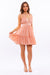 Full view of HALTER BABYDOLL TIERED MINI DRESS - apricot