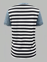 Black and white striped t-shirt with denim sleeves on a gray background