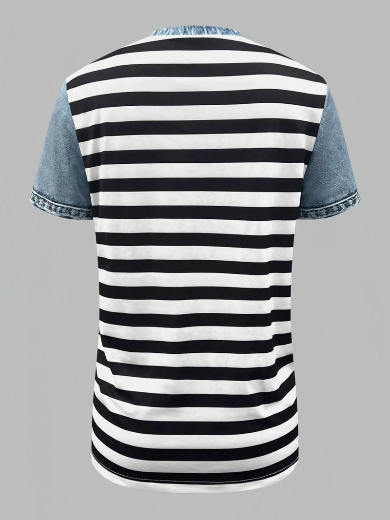 Black and white striped t-shirt with denim sleeves on a gray background