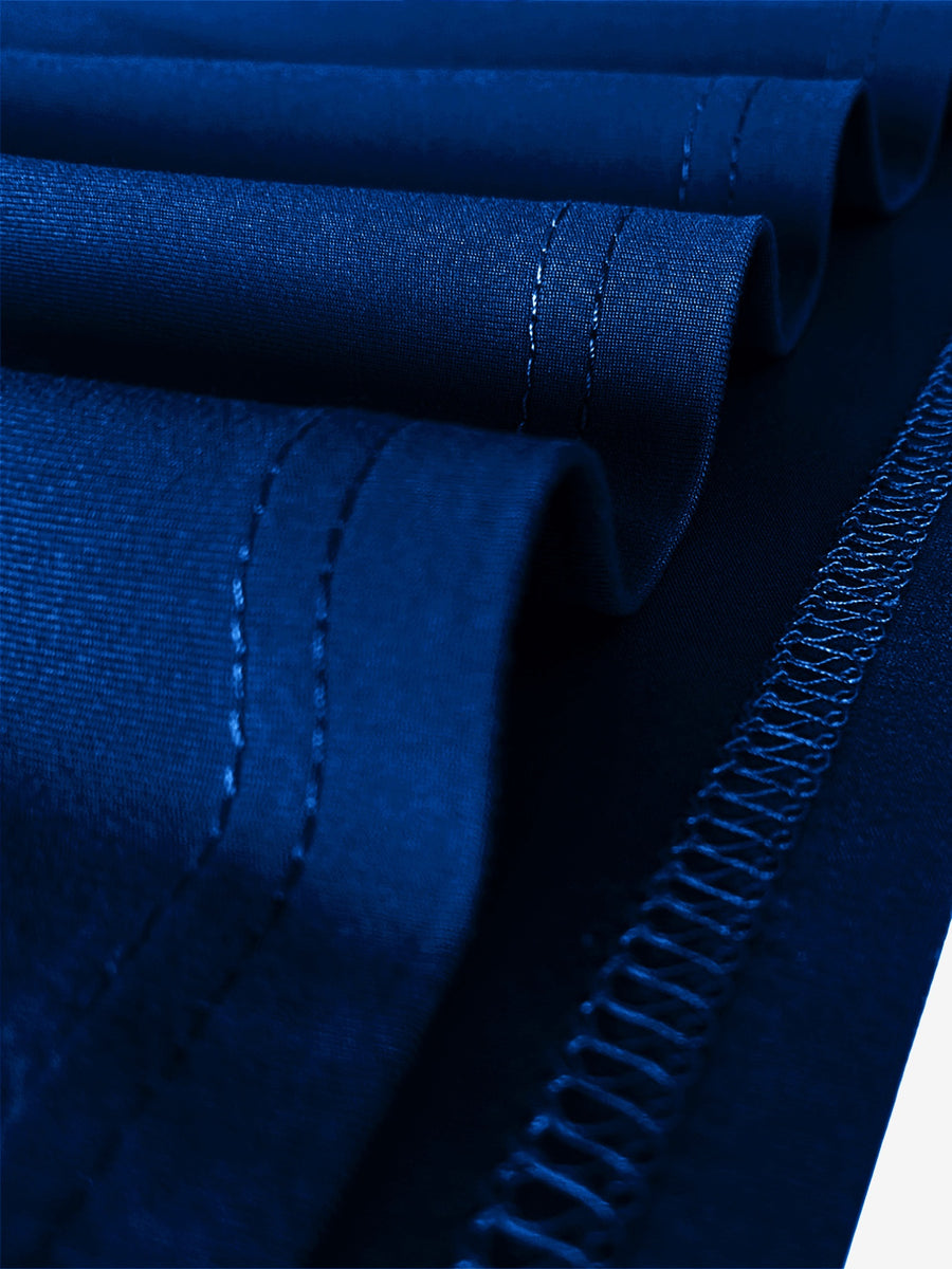 Close-up of blue fabric with stitching details