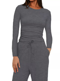 Gray long-sleeve top and pants set on a white background