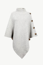 Gray poncho with button details on a white background
