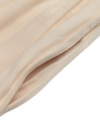 Close-up of beige fabric with a soft texture on a white background