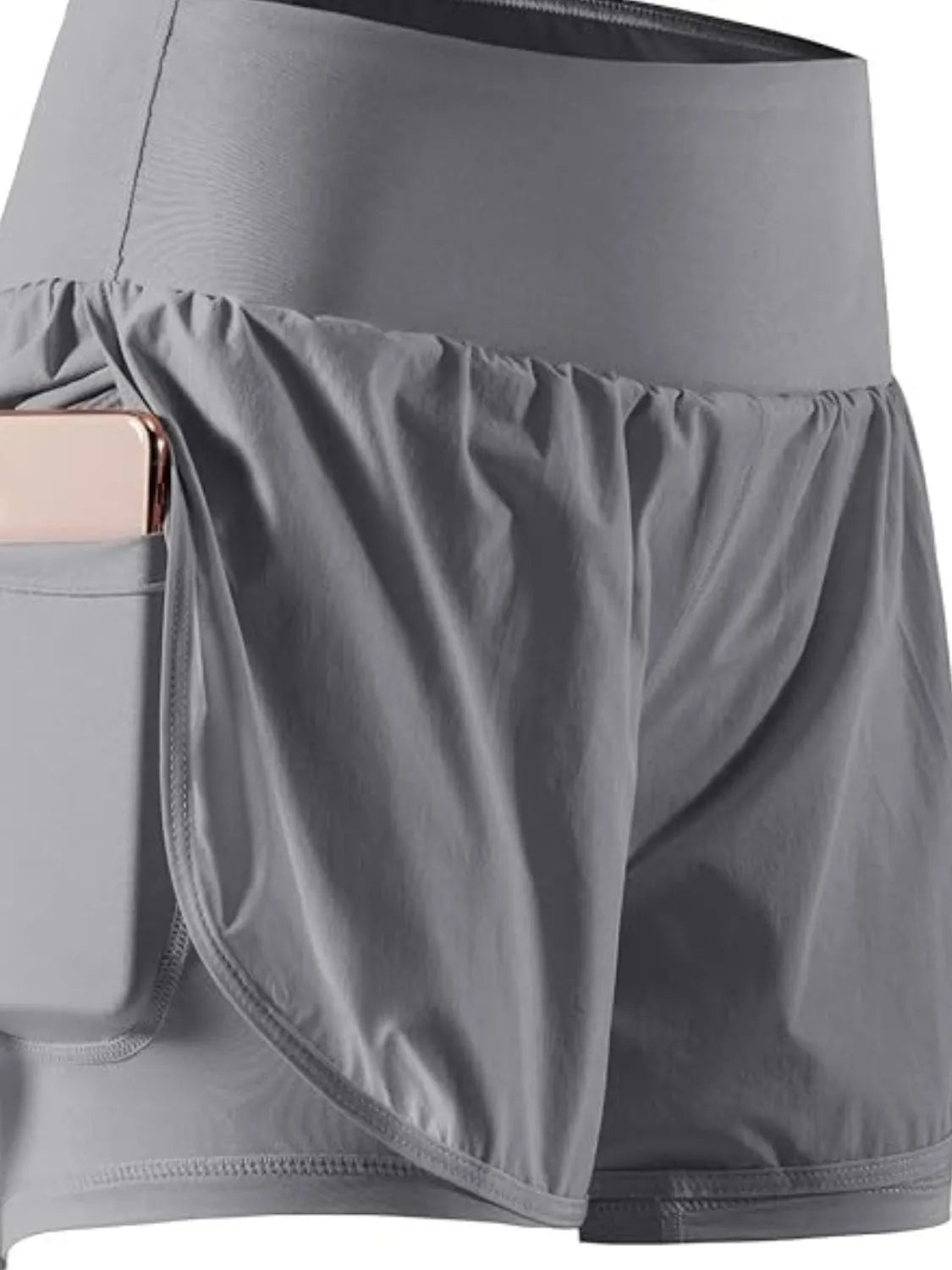 Gray athletic shorts with a pocket on a white background