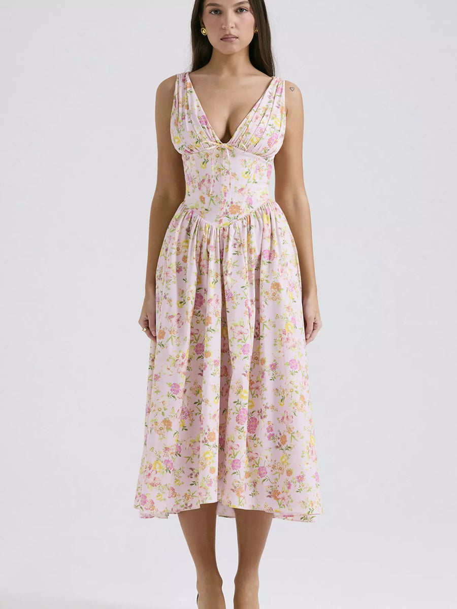 Woman wearing a floral dress on a white background