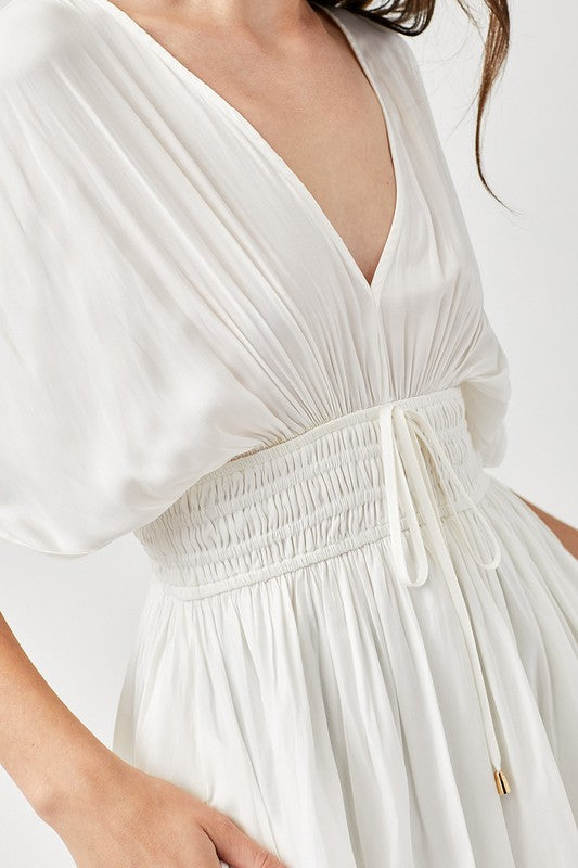 SMOCKED WAIST WITH TASSEL STRAP DRESS