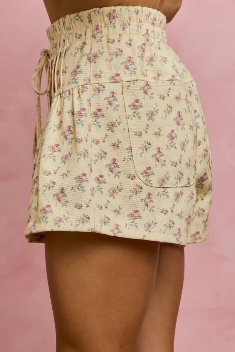 Floral mini skirt on a pink background