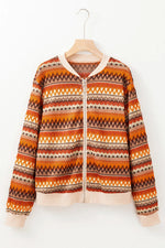 Patterned jacket on a hanger against a white background