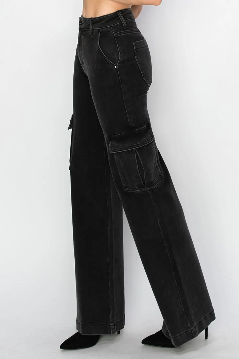 Black wide-leg pants worn by a person on a white background