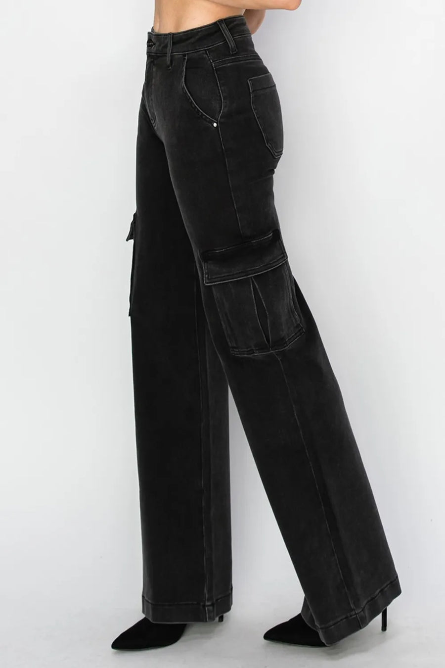 Black wide-leg pants worn by a person on a white background