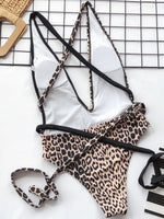 Leopard print bikini set on a grid background
