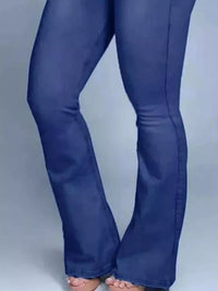 Blue jeans on a plain background
