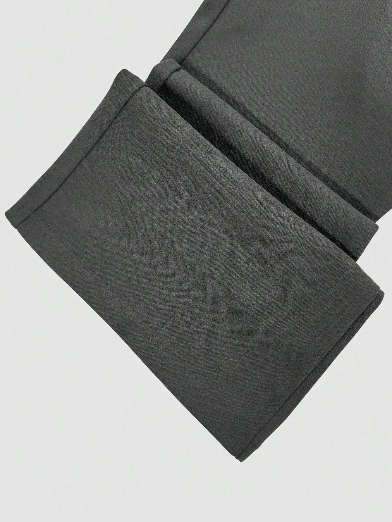 Dark gray fabric on a light gray background