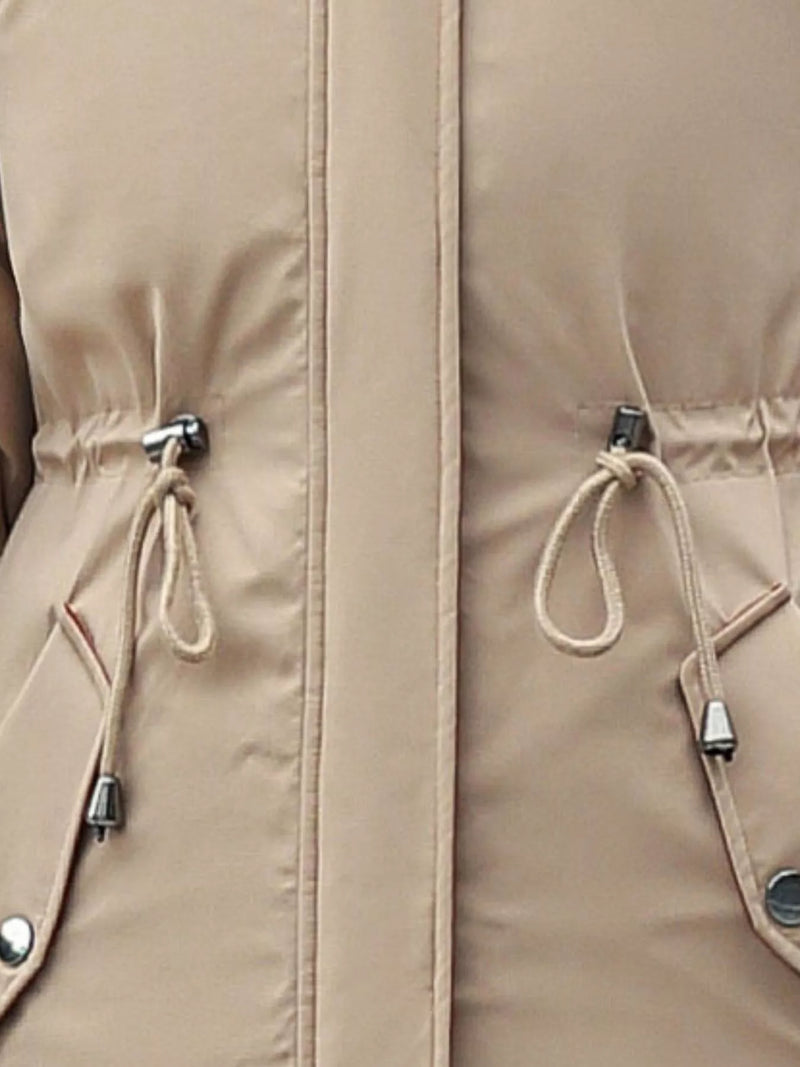 Close up view of pull strings on biege Women's Detachable Longline Hooded Parka with Faux Fur Trim and Drawstring Waist