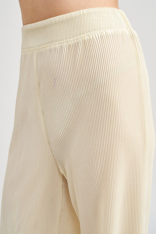 Close up view of waist band of SCALLOP HEM HIGH WAISTED PANTS