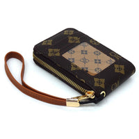 Black patterned wallet with brown strap on a white background